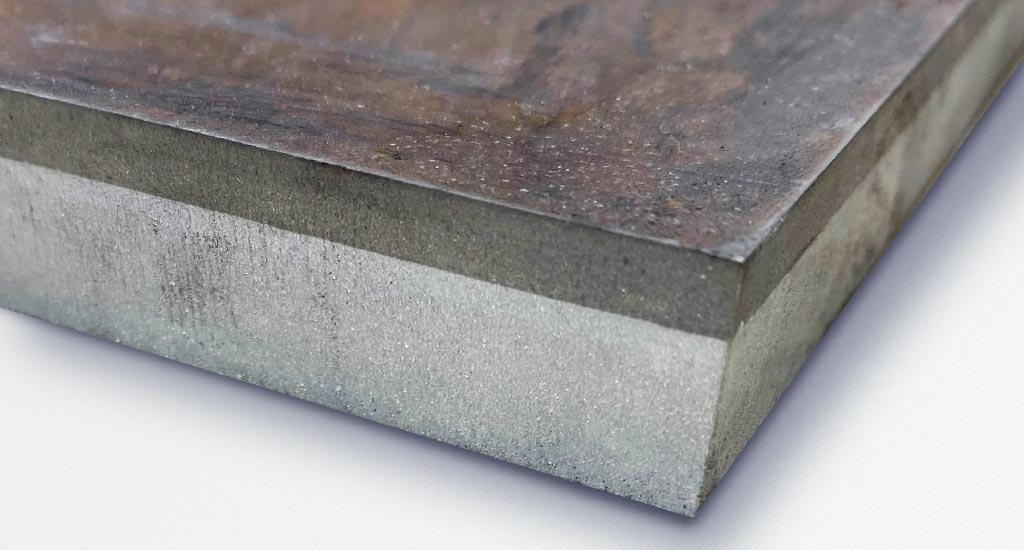Roll bonding process showing metal layers being fused under high pressure