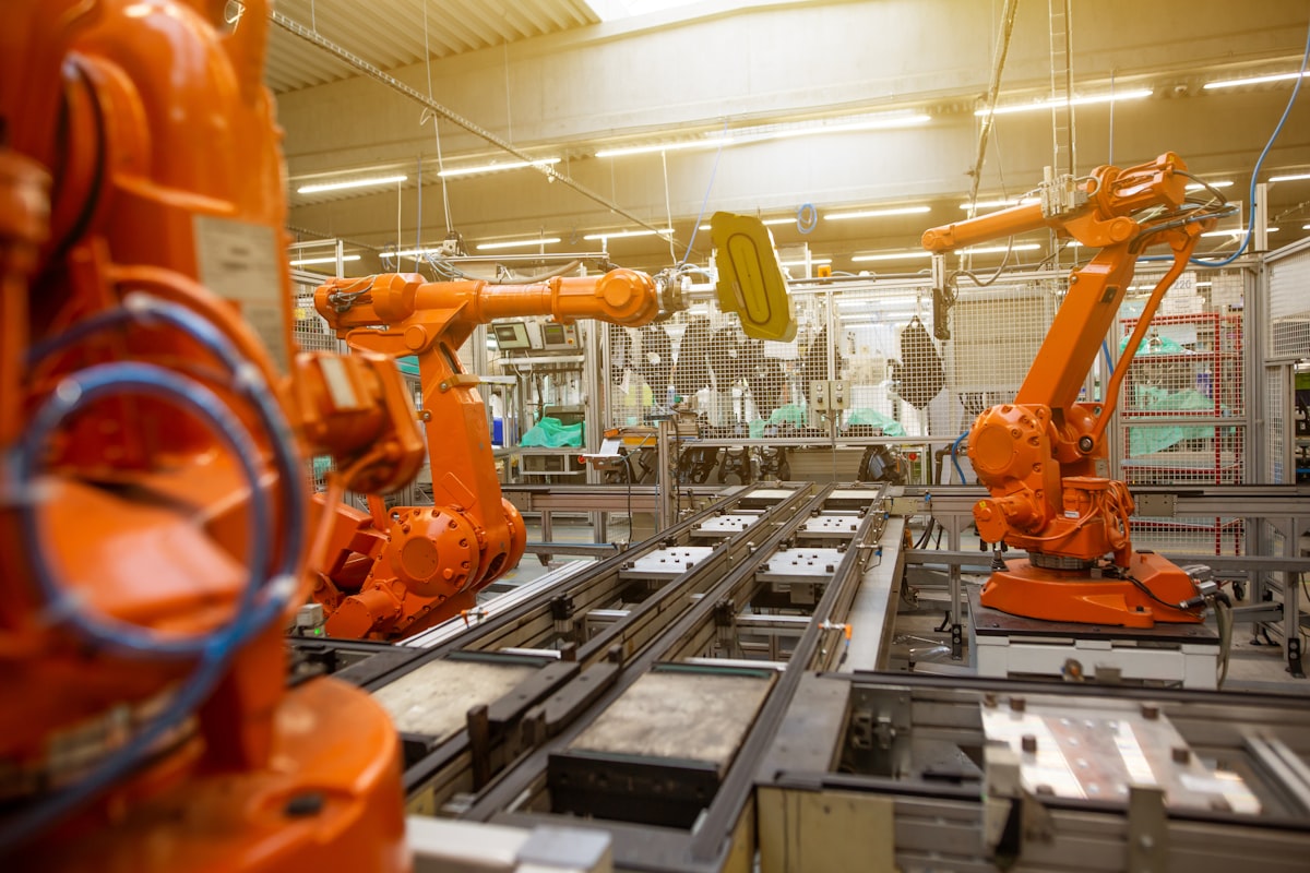 Cookware manufacturing production line in a Chinese factory showing metal fabrication equipment and finished products