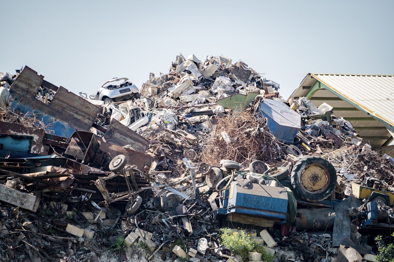 Stainless steel scrap metal at a recycling facility - showing how cookware feeds back into the metal supply chain