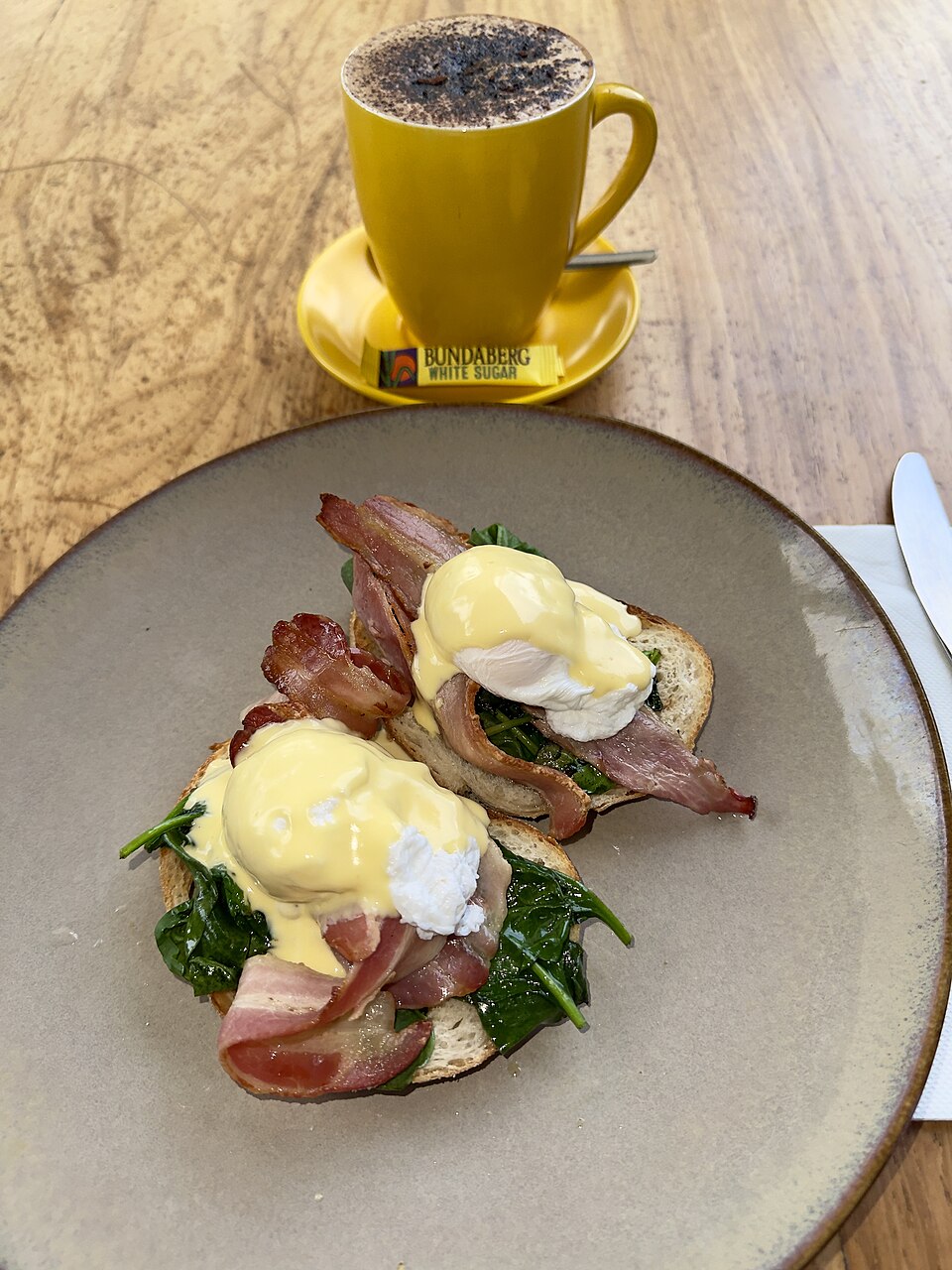 Eggs Benedict with poached eggs served at a hotel restaurant - the end product driving commercial egg poacher demand in hospitality